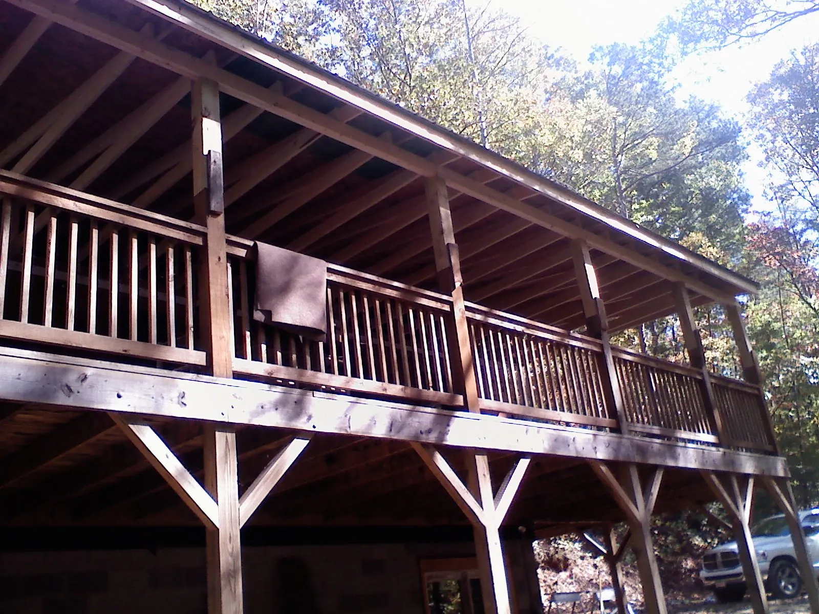 Timber framing under a new elevated porch and deck — Roof Leak Repair in Bouton by Roofing Brothers